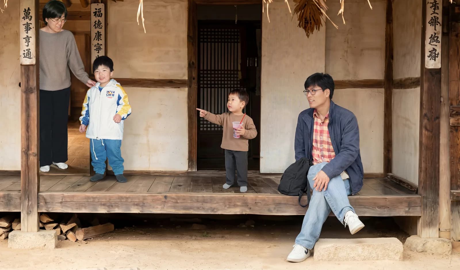 Four separate photos become one family portrait — 4-person composite