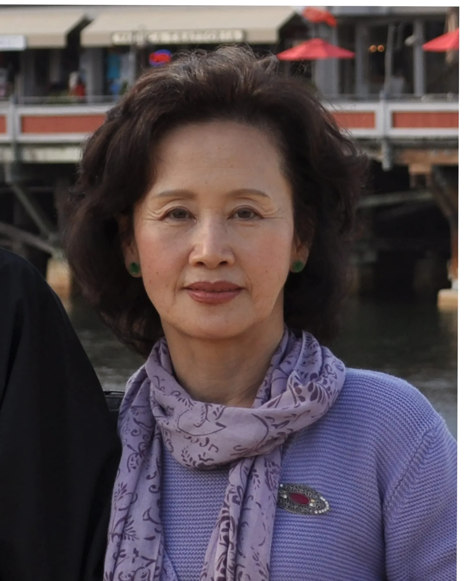 From a group photo, just one person — extracting a mother's face for memorial composite — before