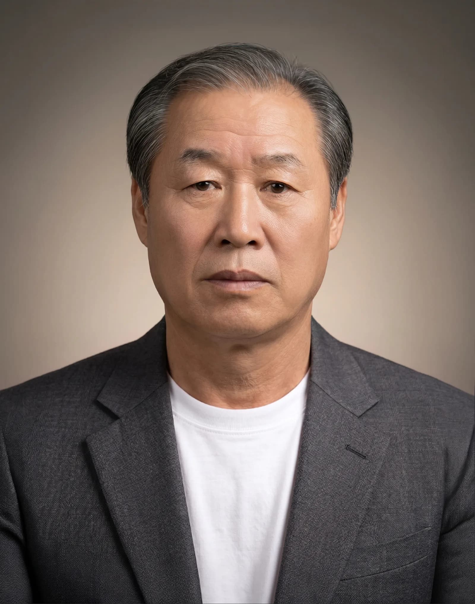 Memorial portrait from an old ID photo — keep the suit or go casual