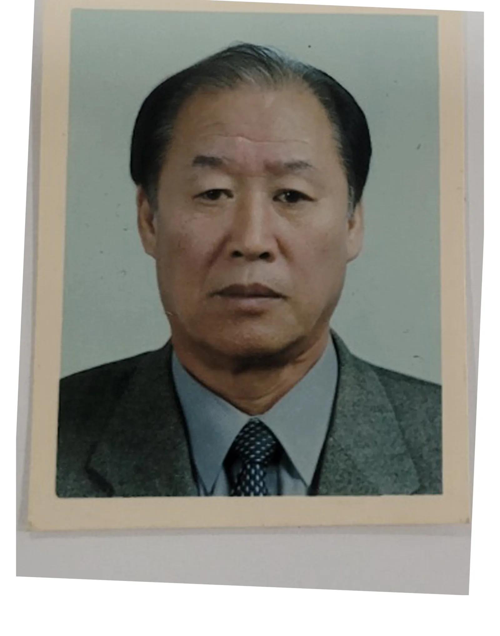 Memorial portrait from an old ID photo — keep the suit or go casual — original